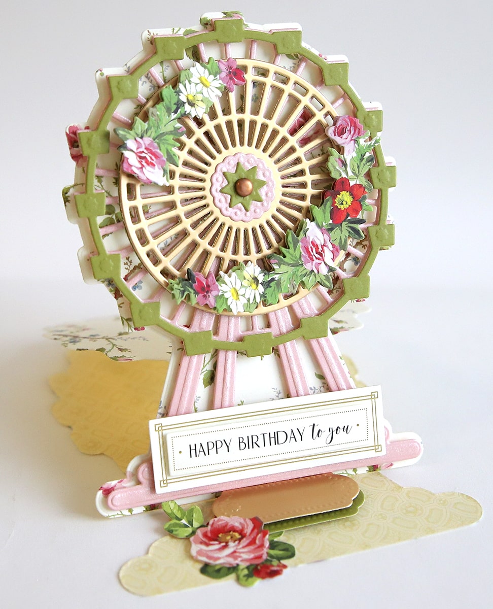 a close up of a birthday card with a ferris wheel.