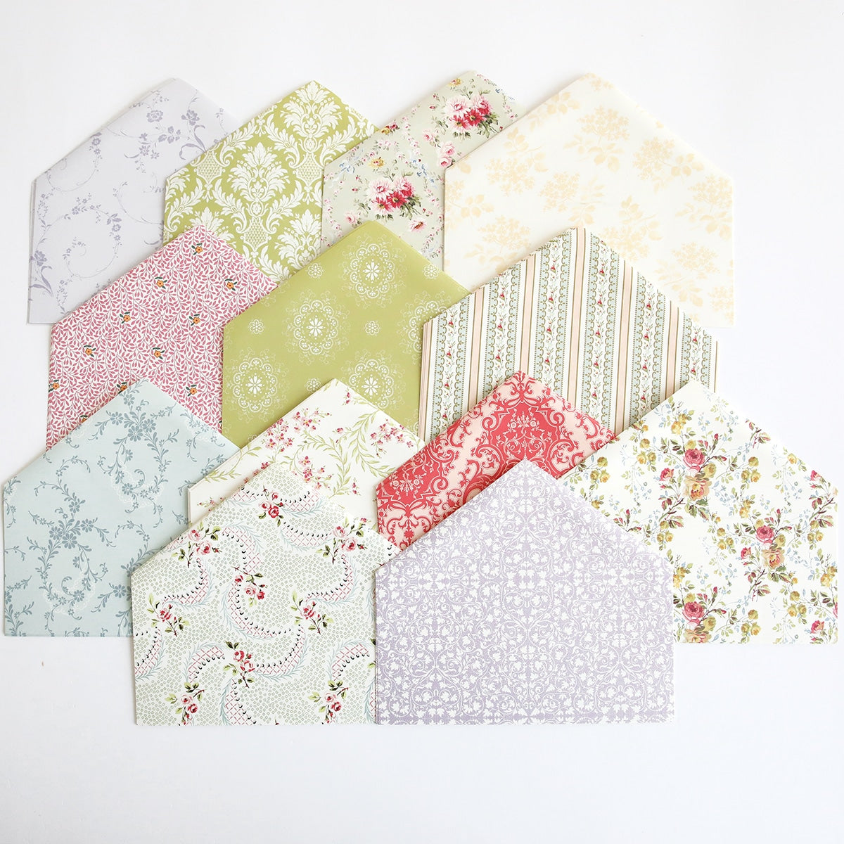 A bunch of Floral Envelope Liners with different patterns on them.