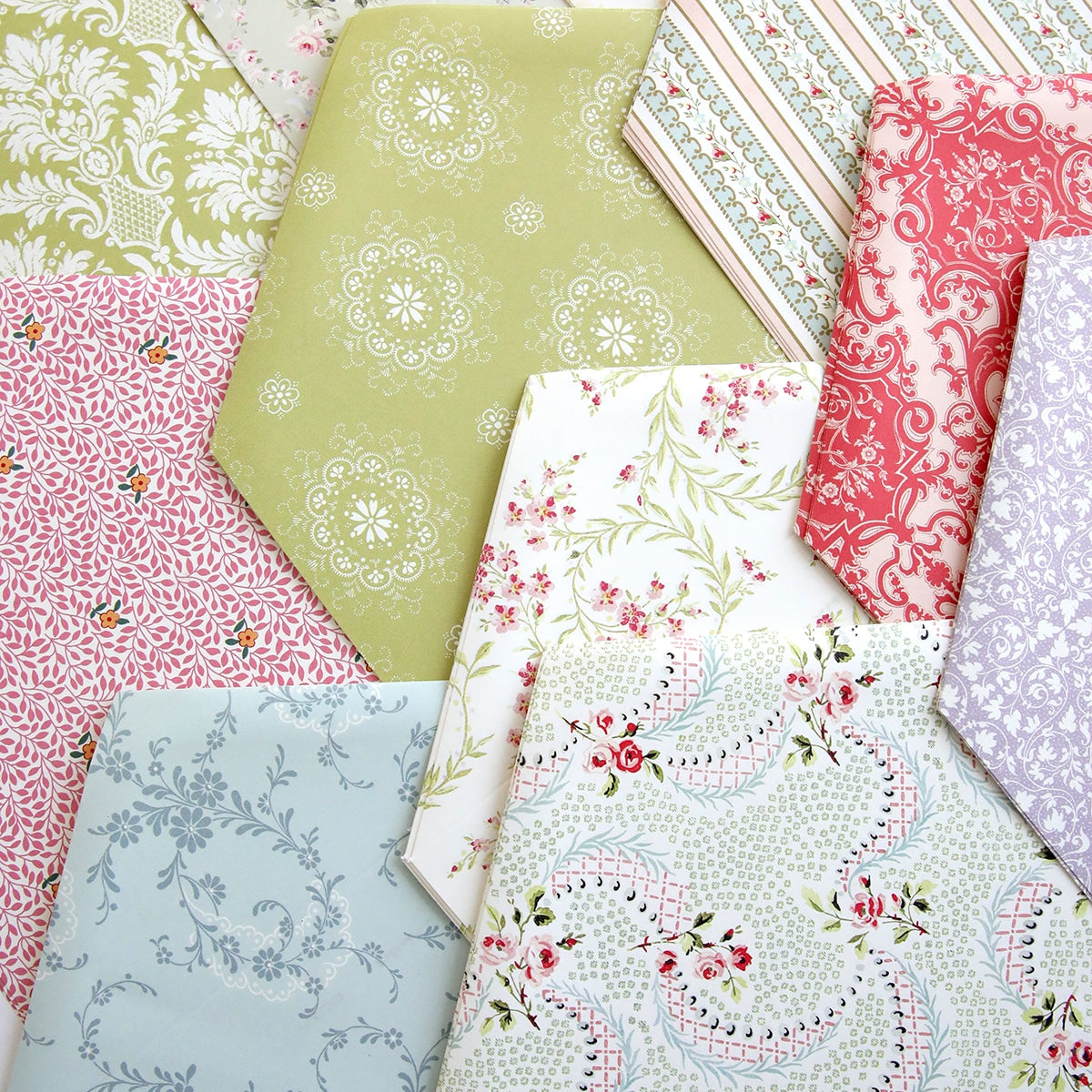 A bunch of different fabrics with Floral Envelope Liners designs on them.