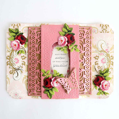 a pink card with roses on it.