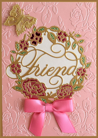 a close up of a greeting card with a bow.