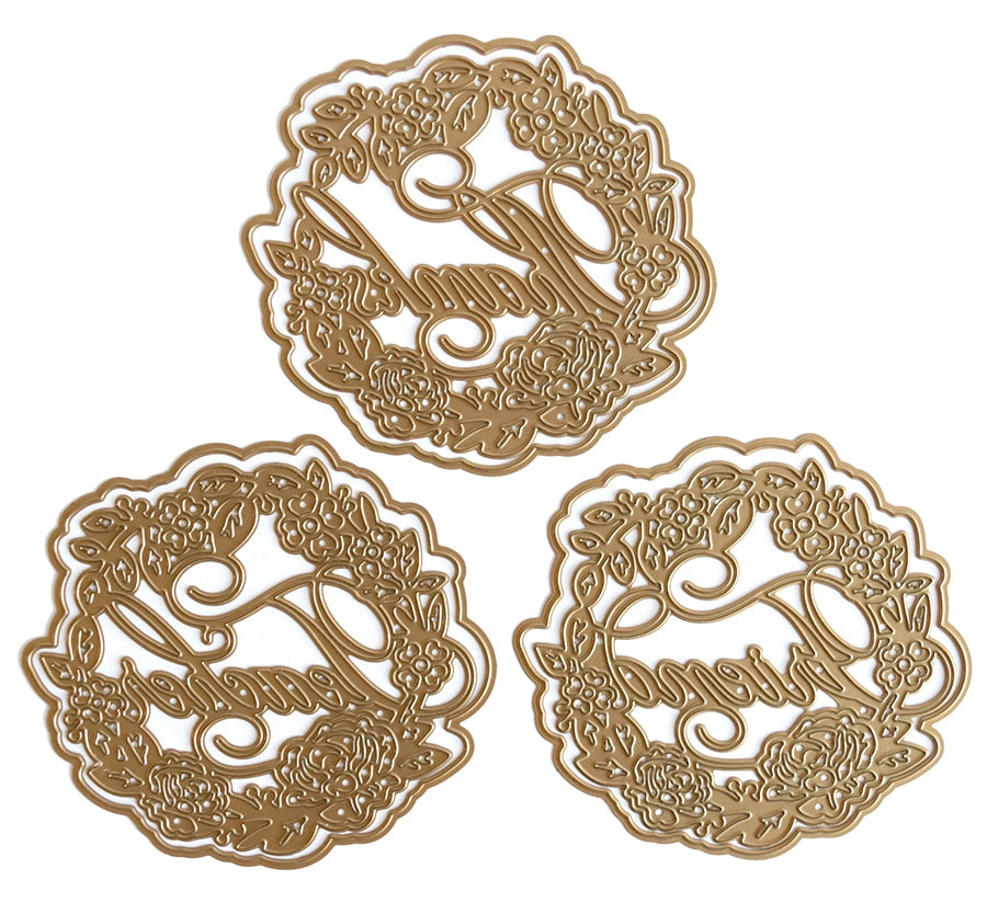 a set of three metal coasters with arabic writing.