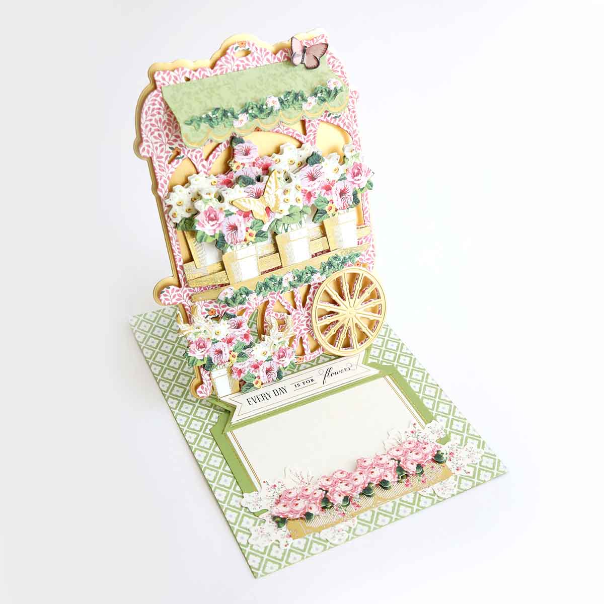a card with a horse drawn carriage on it.
