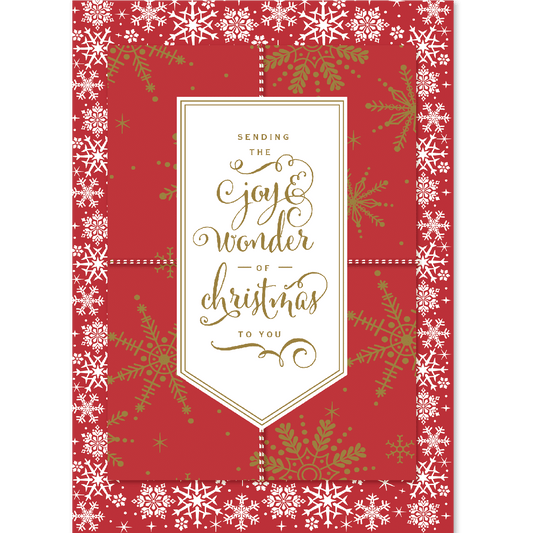 a red and white christmas card with gold lettering.