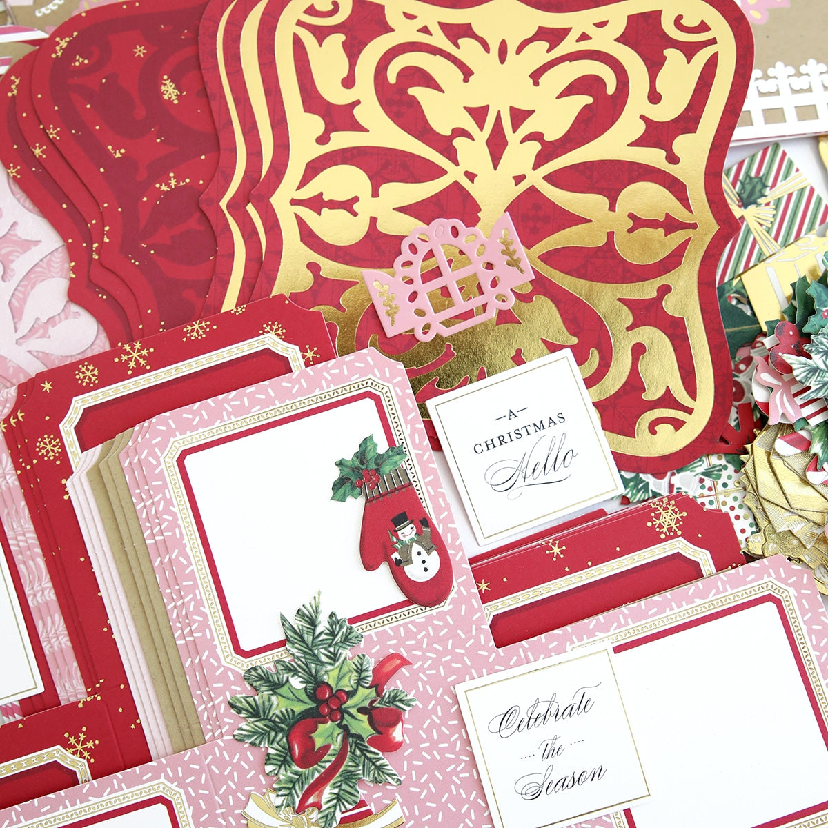 a close up of a red and gold christmas card.