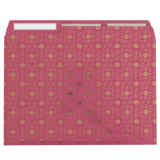 a pink folder with gold circles on it.