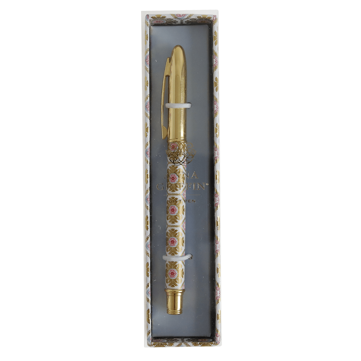 a gold and white pen in a box.