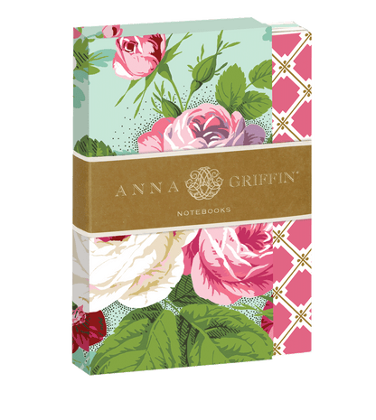 a notebook with a bunch of flowers on it.