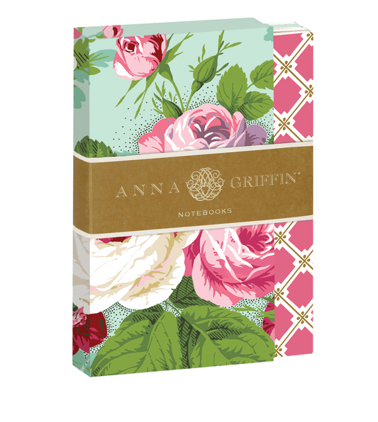 a notebook with a bunch of flowers on it.
