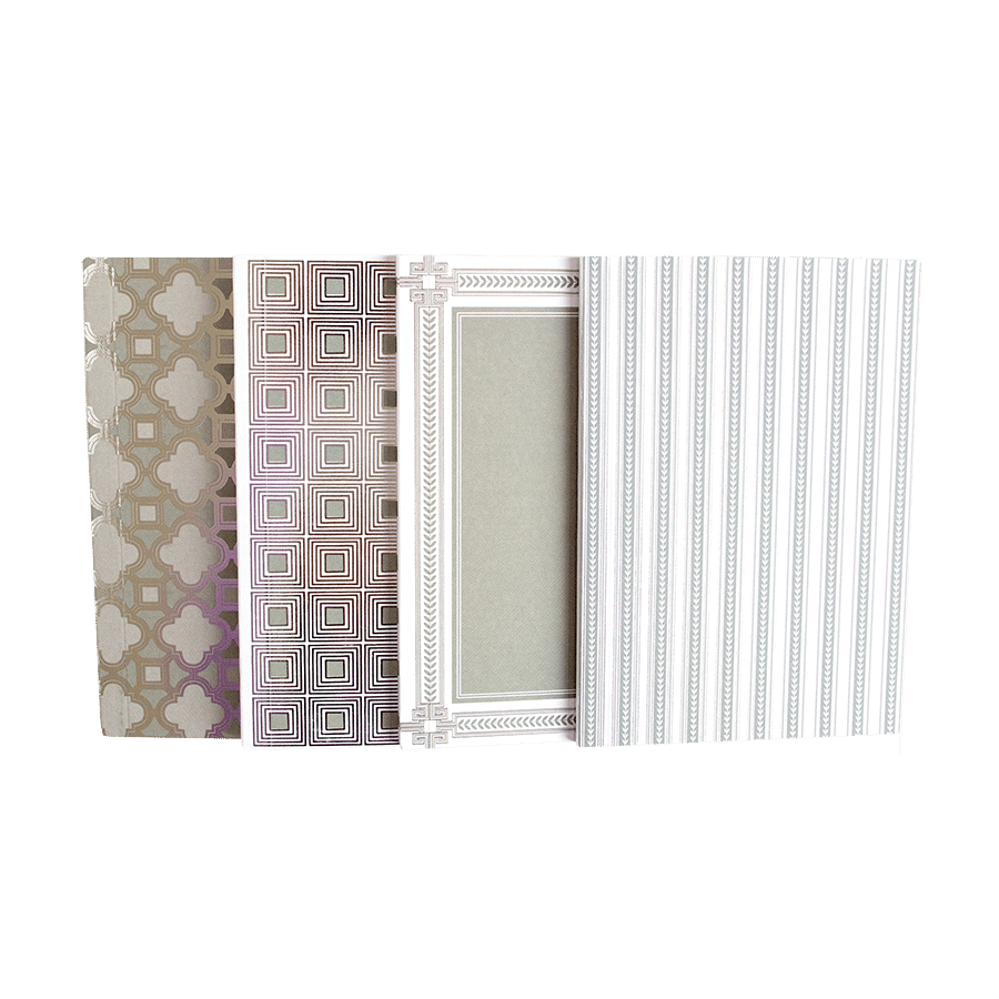a set of three books with different patterns on them.