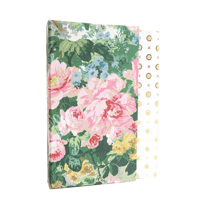 a notebook with a floral pattern on the cover.