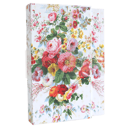 a floral print notebook with a green background.