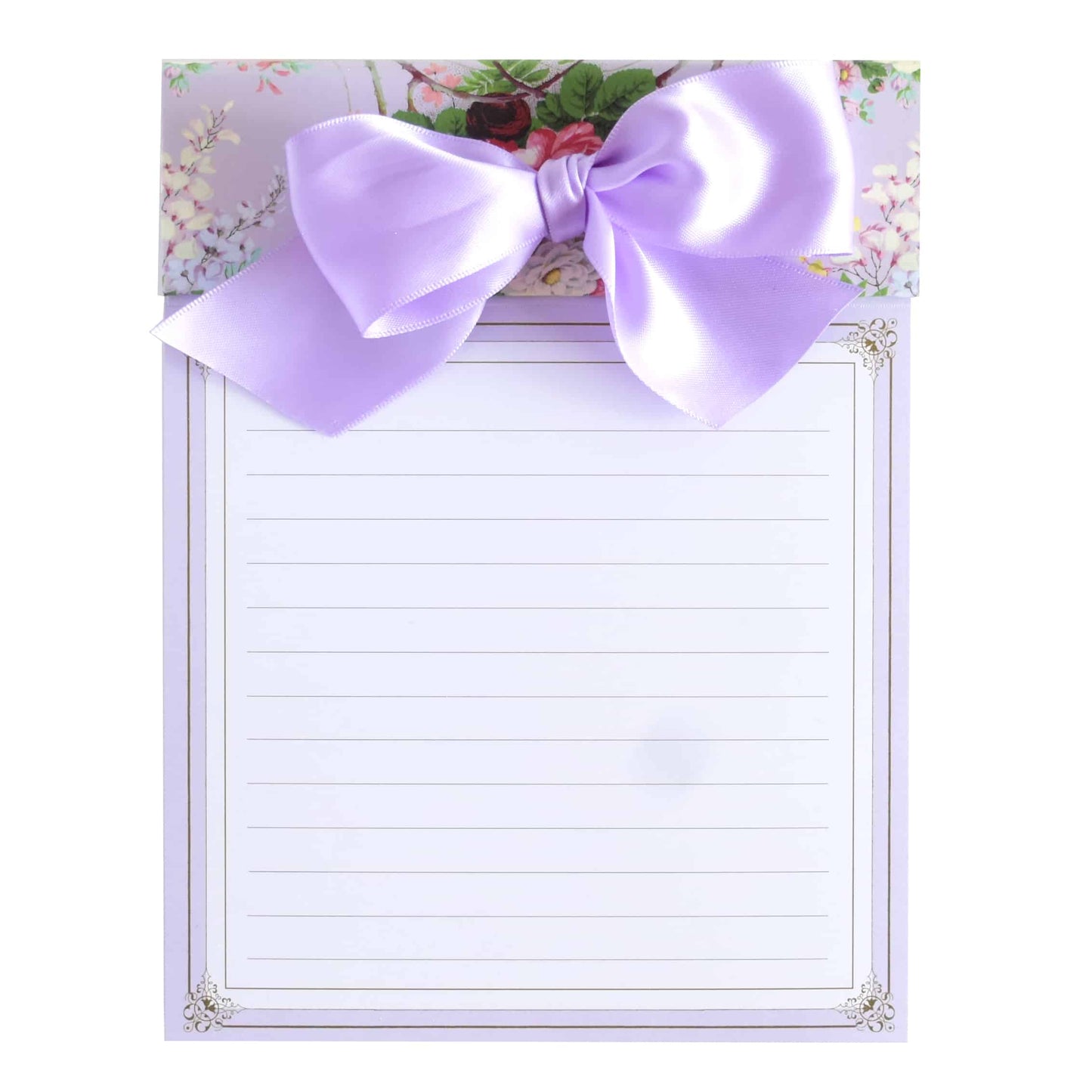 a notepad with a purple bow on top of it.