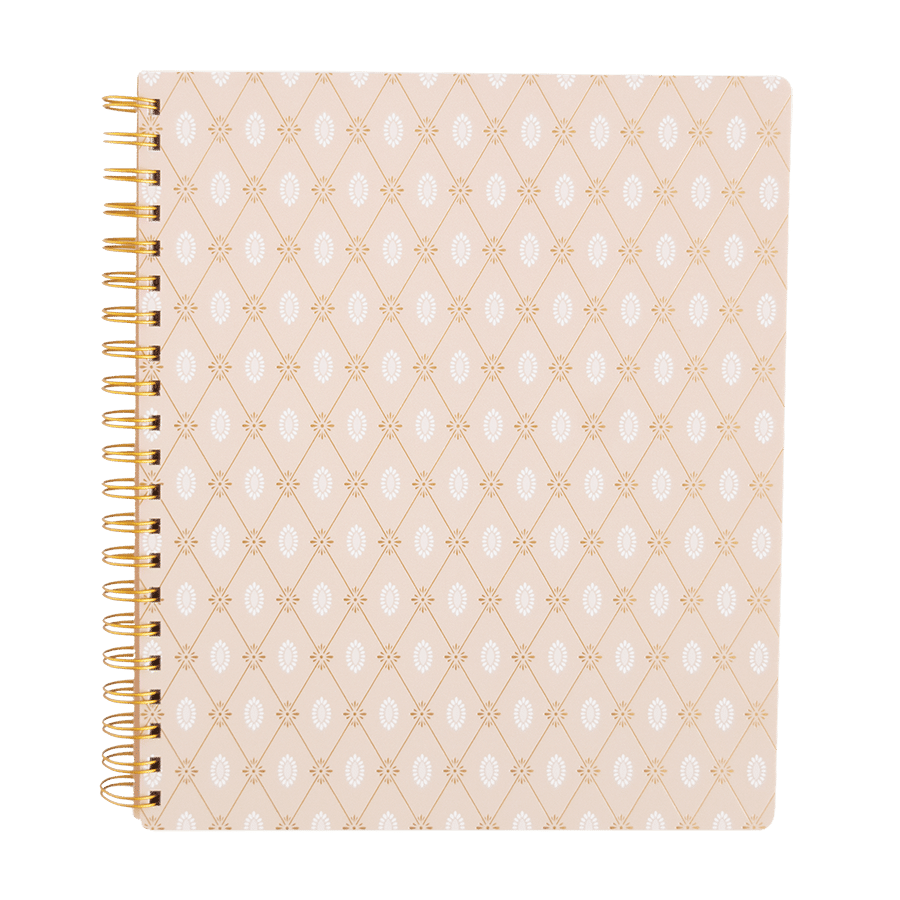 a spiral notebook with a pattern on it.