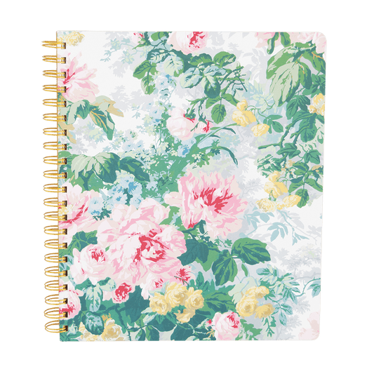 a notebook with a floral pattern on it.