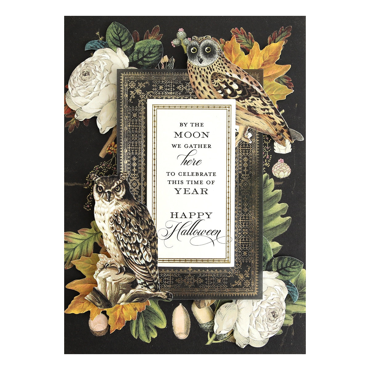 a picture frame with two owls and flowers.