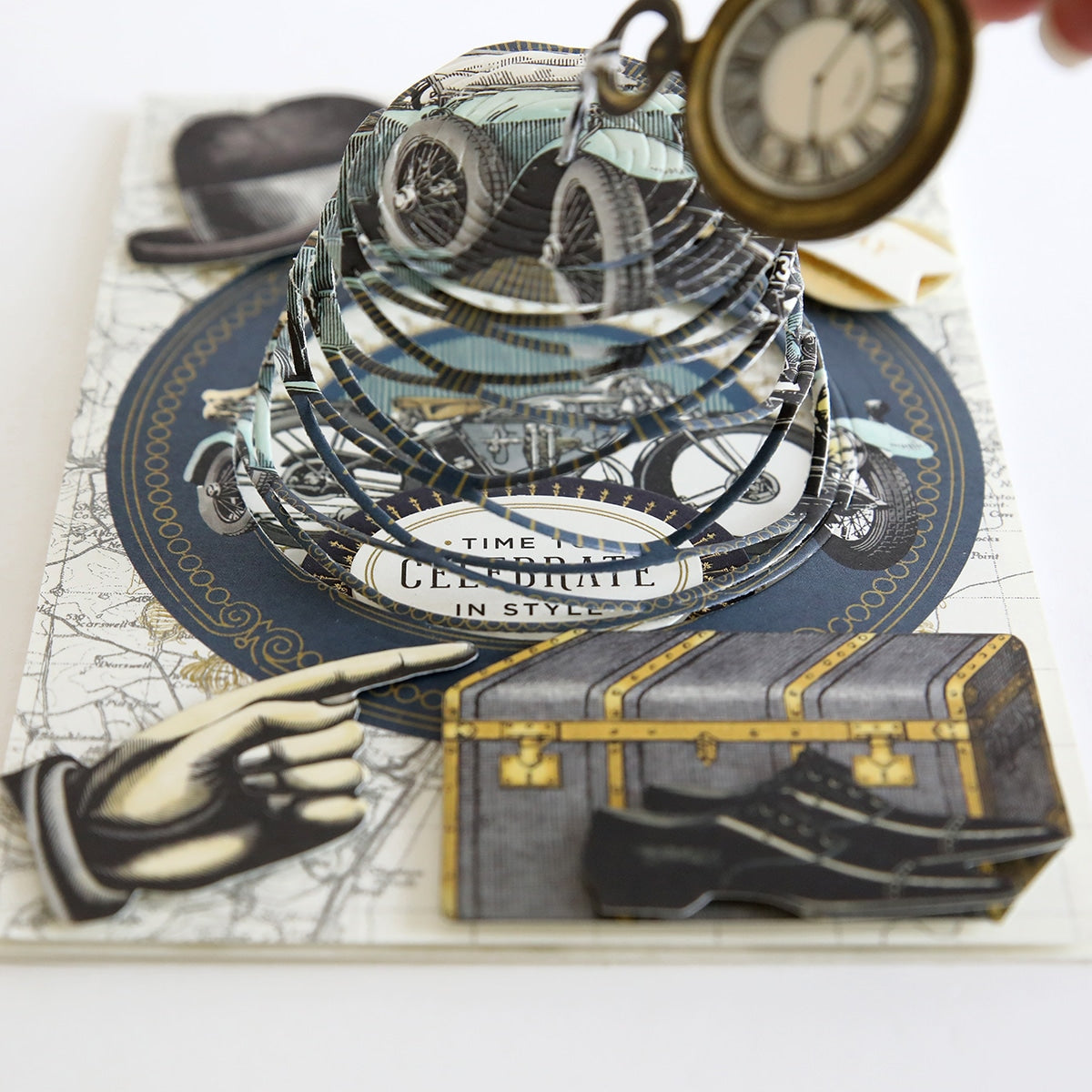 A piece of Handsome Kirigami Scenes and Embellishments with a clock and a hand.