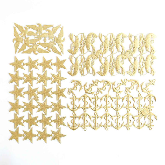 a group of cut out letters and numbers on a white surface.