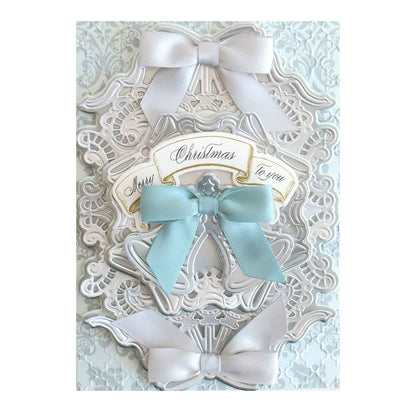 a white card with a blue ribbon and a bow.