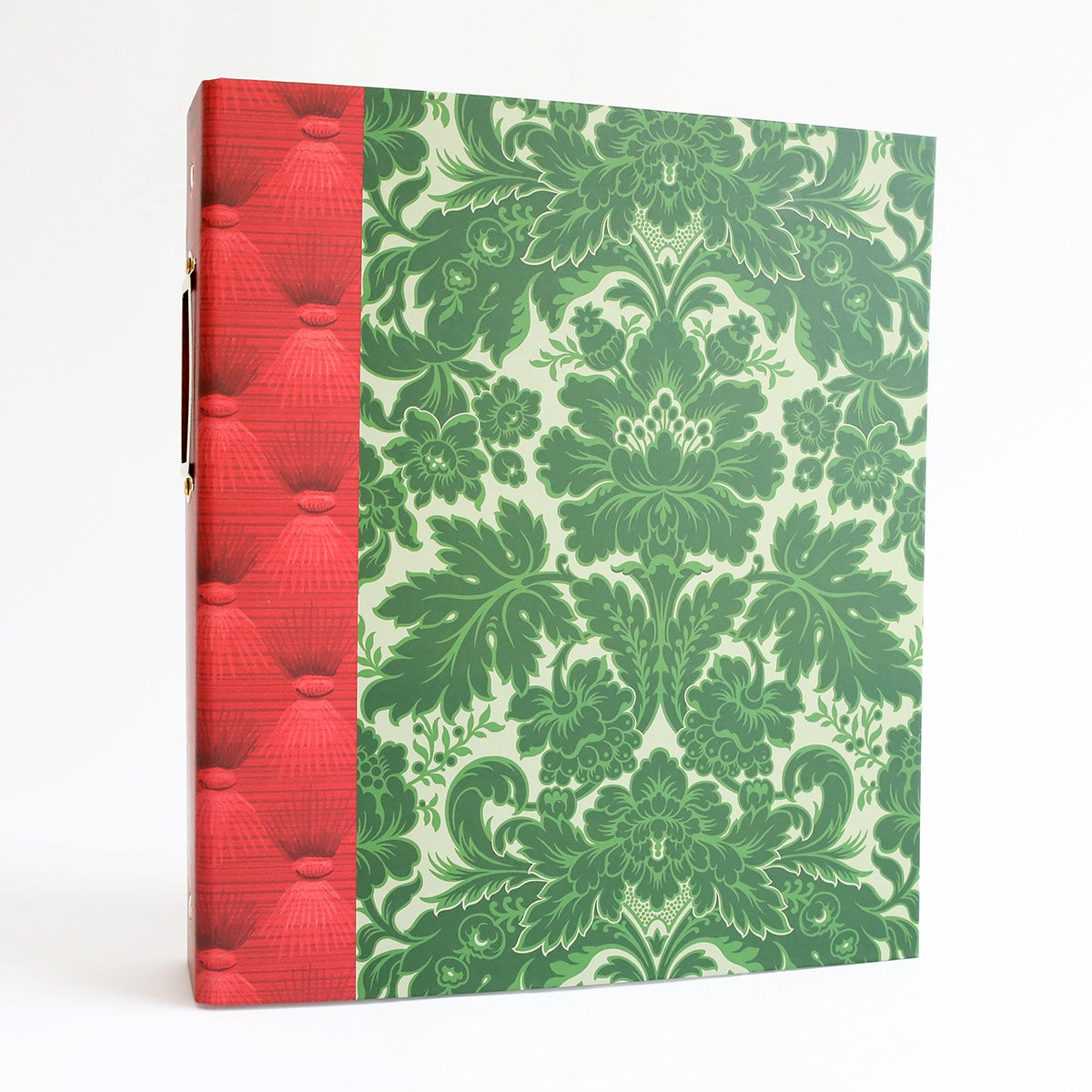 A green and red Holiday Die Storage Binder with a red cover.