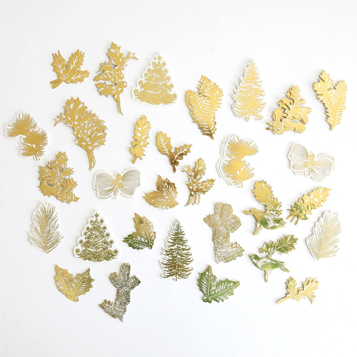 a collection of gold and silver leaf shapes.