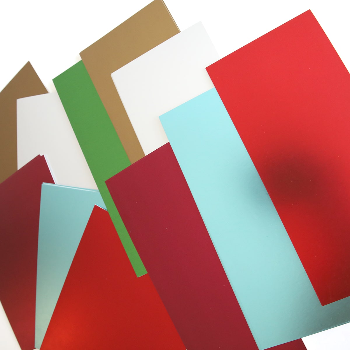 Red, green, blue, and yellow Holiday Matte Foil Cardstock.