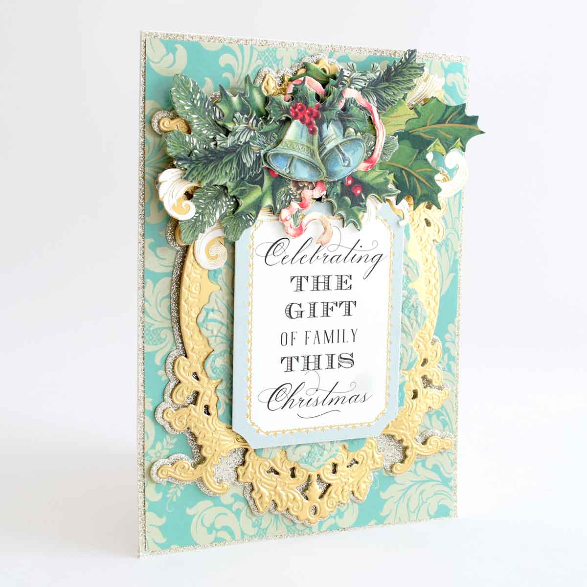 a christmas card with holly and holly leaves.