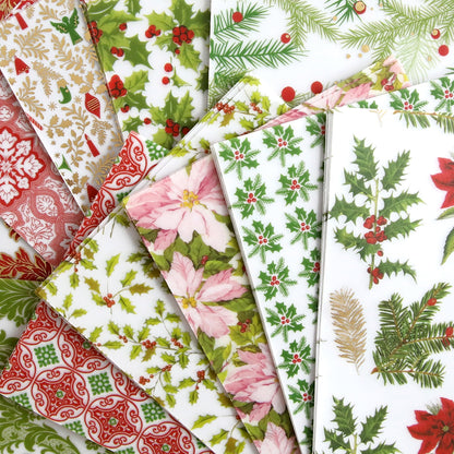 a pile of Holiday Vellum Cards and Envelopes with holly leaves and berries.