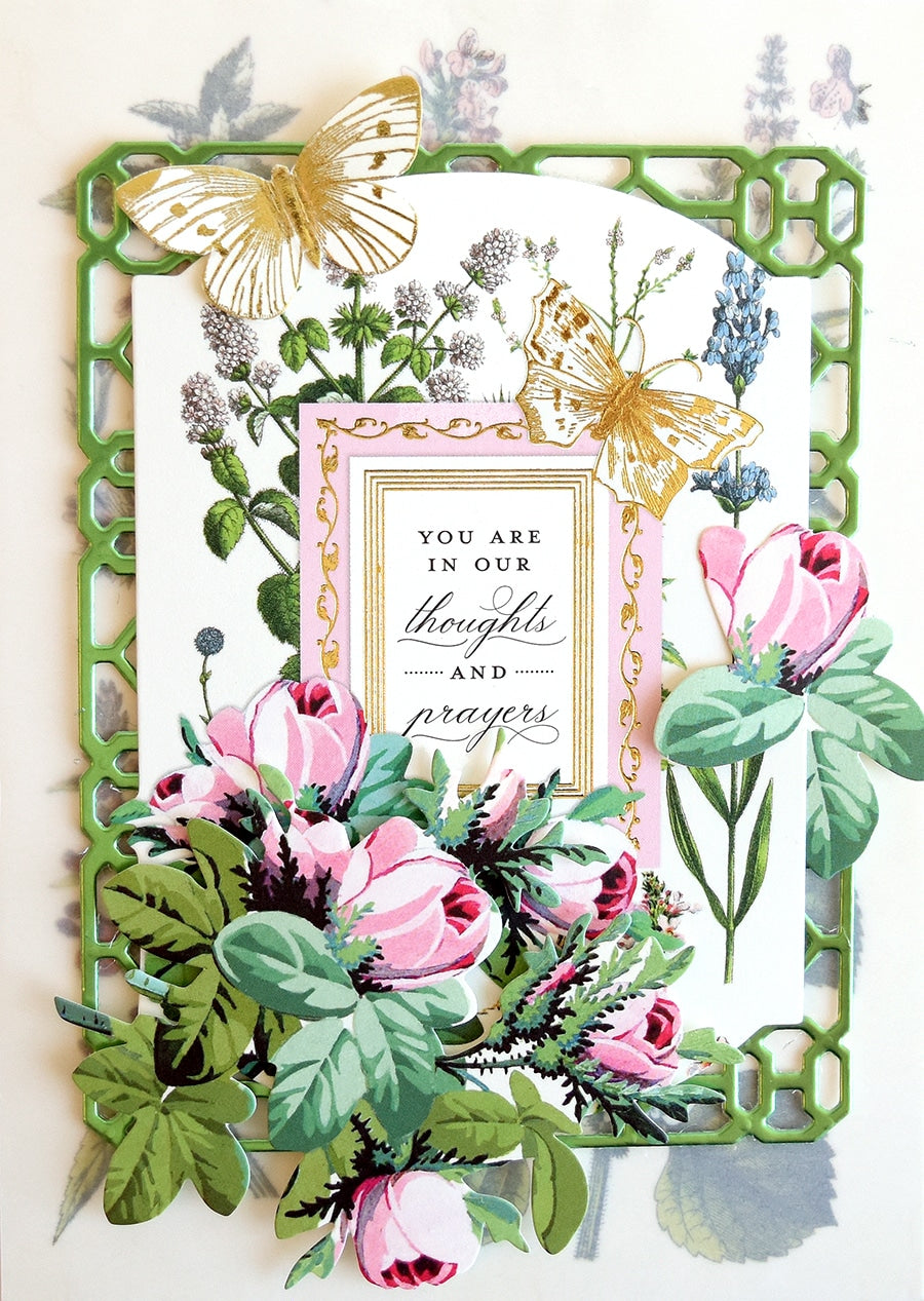 a card with flowers and butterflies on it.