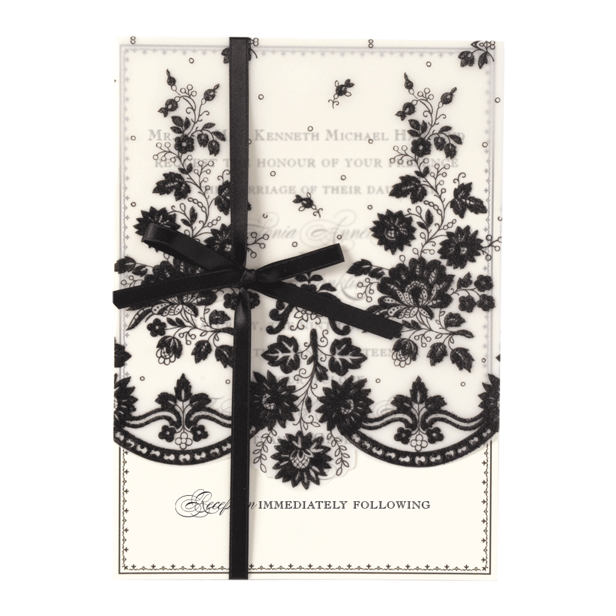 a black and white card with a ribbon on it.