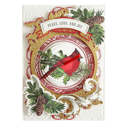 a christmas card with a cardinal on it.