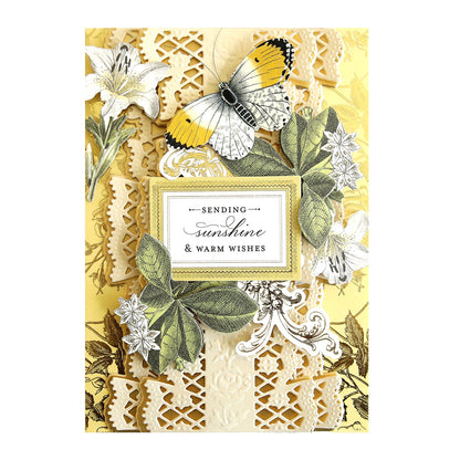 a card with butterflies and lace on it.