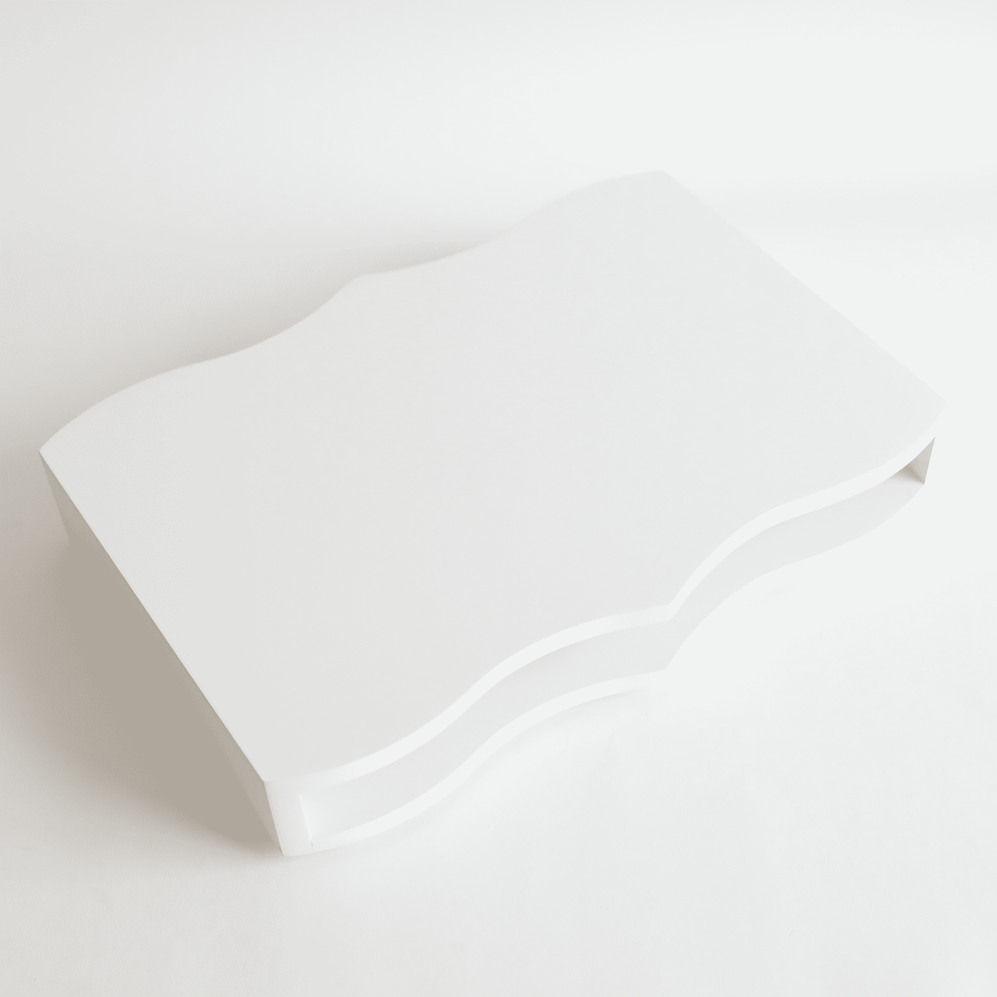 a piece of white paper sitting on top of a table.