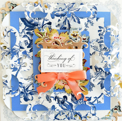 a blue and white greeting card with a bow.