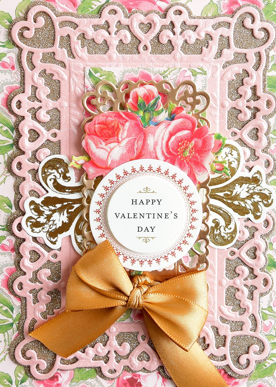 a close up of a card with a bow on it.