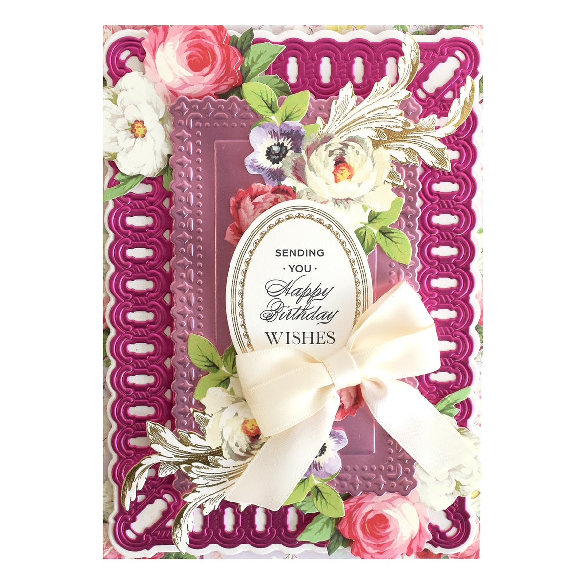 a birthday card with flowers and a ribbon.