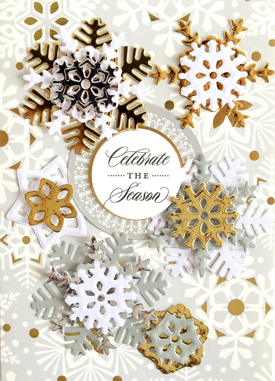 a close up of a card with snowflakes.