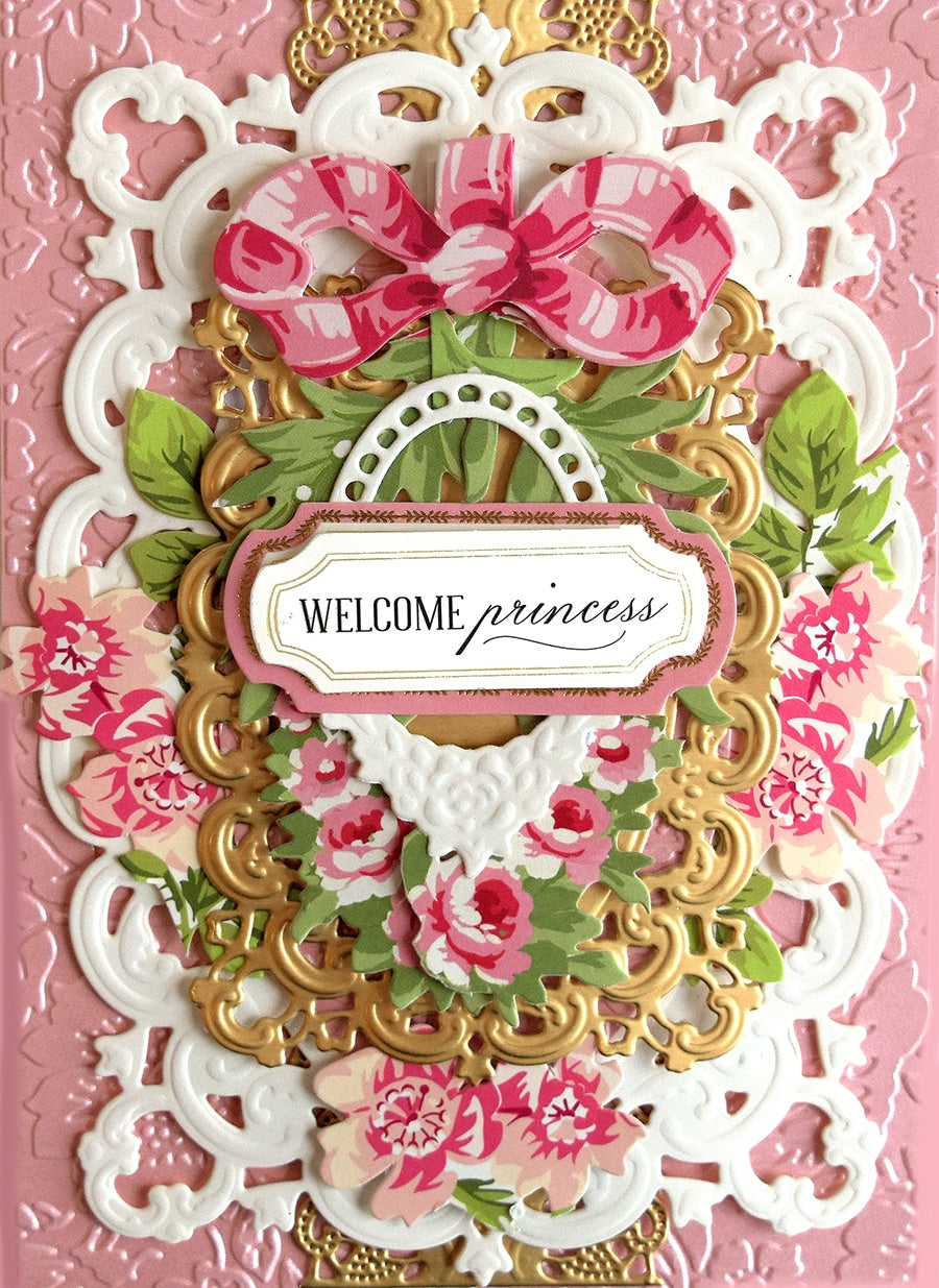 a pink card with a welcome princess sign on it.