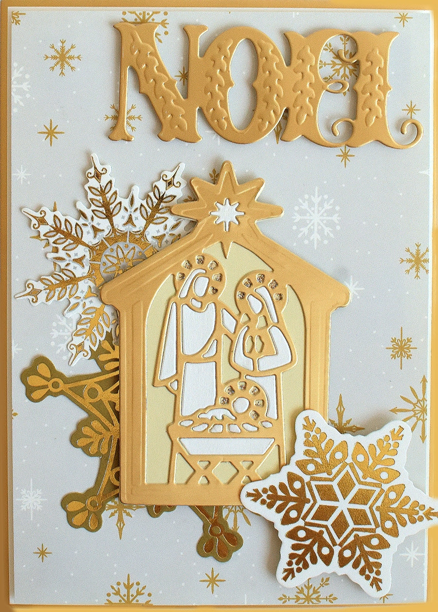 a close up of a christmas card with a nativity scene.