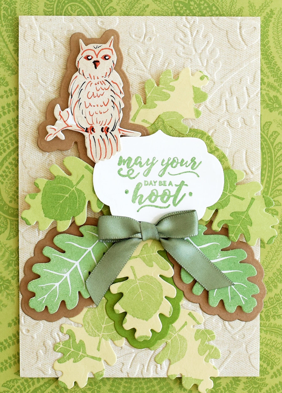 a close up of a card with an owl on it.
