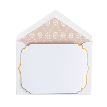 a white envelope with a gold border.
