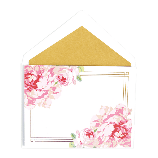 a white envelope with pink flowers on it.