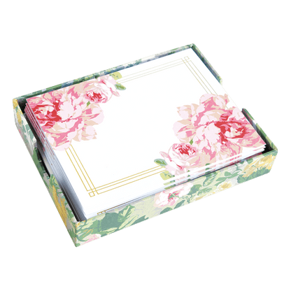 a flowered box with a white card inside.
