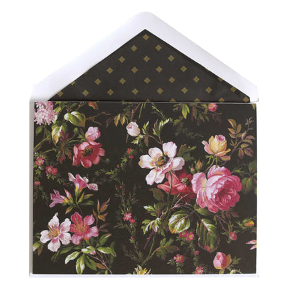 a black envelope with pink and white flowers on it.
