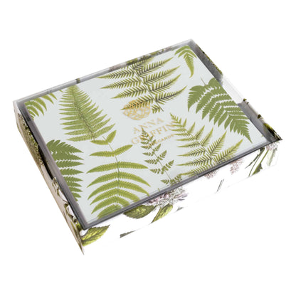 a box with a fern print on it.