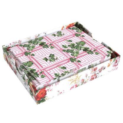 a pink and white box with flowers on it.