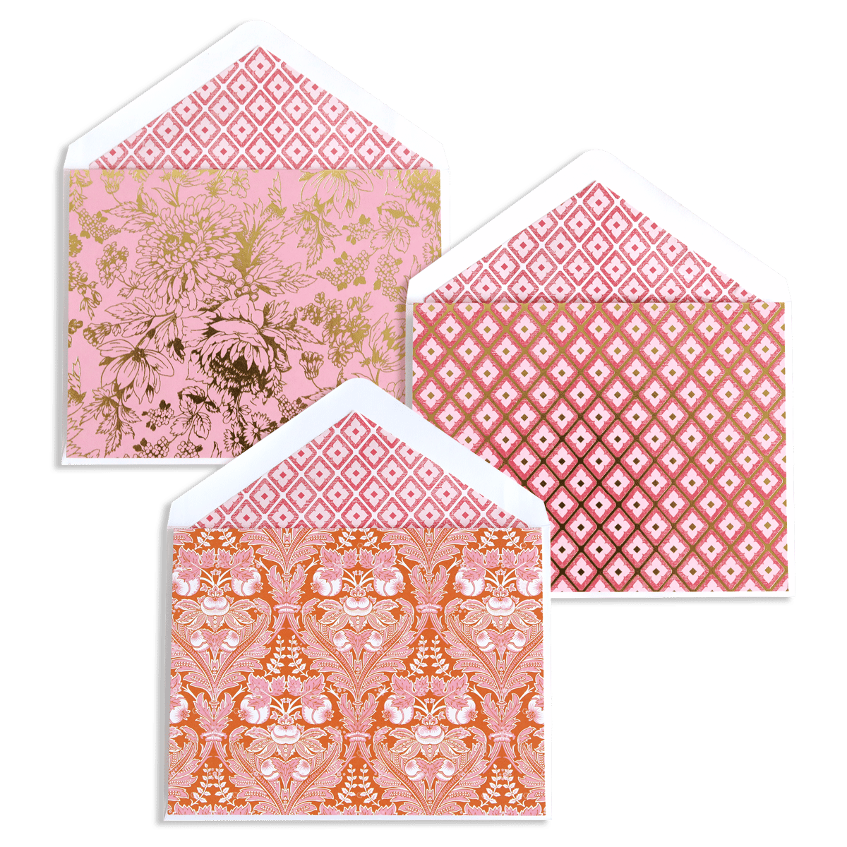 three envelopes with pink and orange designs on them.
