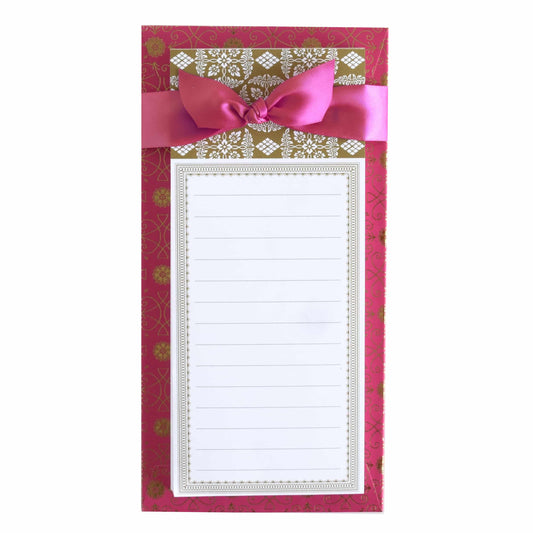 a notepad with a pink ribbon and a bow.