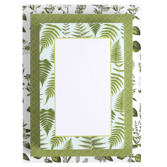 a green and white picture frame with leaves on it.