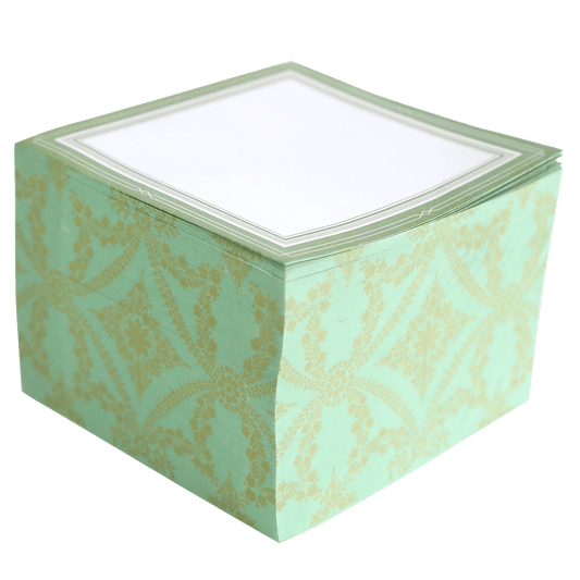 a green and white box with a white lid.
